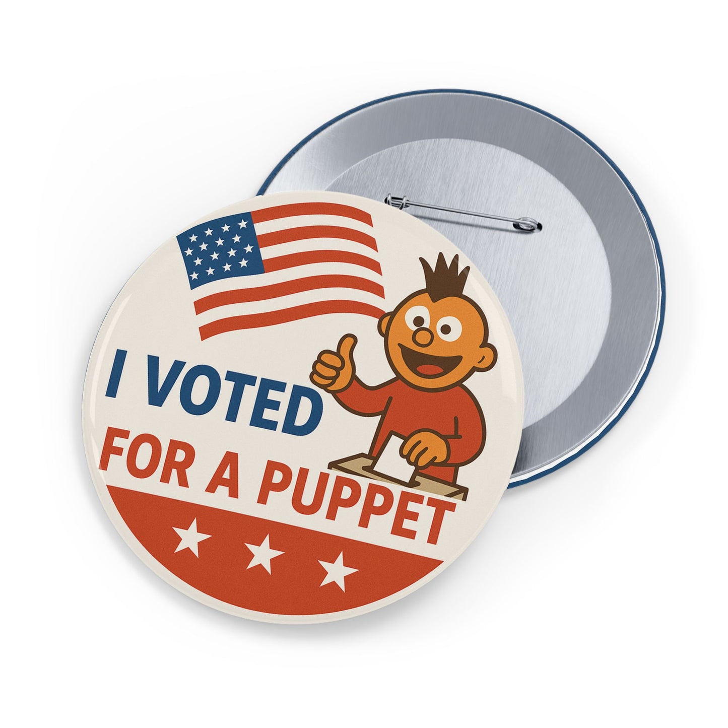 Button badge with 'I Voted For A Puppet' text and American flag on a white background