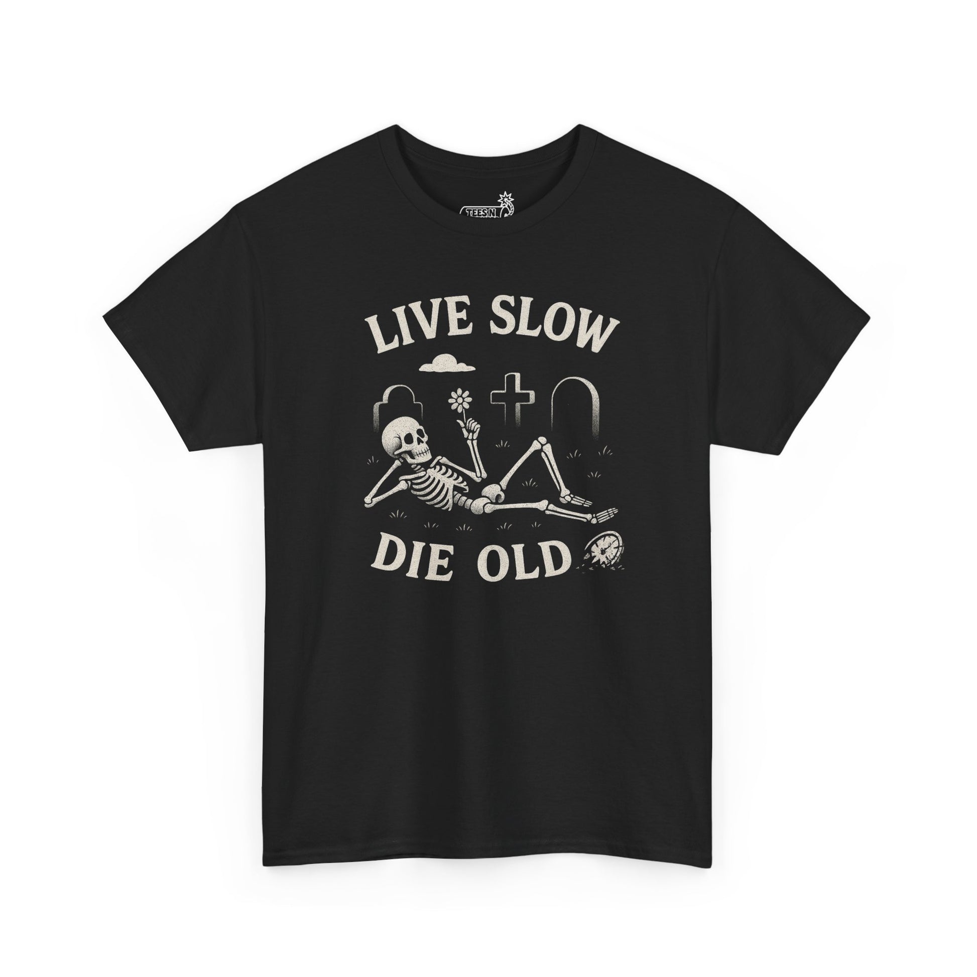 Black t-shirt with relaxing skeleton holding flower  graphic and 'Live Slow Die Old' text 